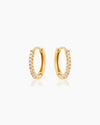 The Amelie Huggies, pavé-set gold earrings perfect for brightening up your look