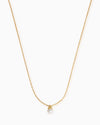 The Alicia, a classic pearl pendant necklace with a freshwater pearl and a delicate golden chain