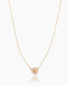 The Flora, a gold pendant necklace featuring a daisy-like flower crafted with cubic zirconia