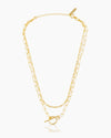 A full-length shot of the Venice, a gold illusion necklace that features two styles in one chain