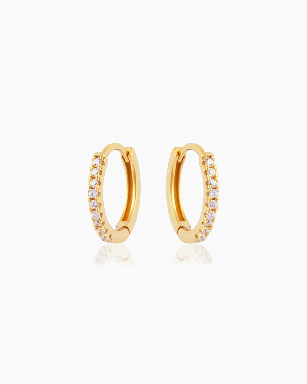 The Amelie Huggies, pavé-set gold earrings perfect for brightening up your look