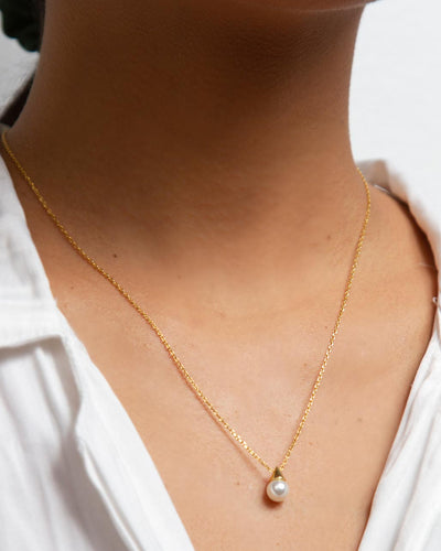 The Alicia Necklace worn around a woman's neck