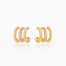 The Chesca Huggies, gold illusion earrings that give off the look of a three-piece stack