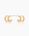 The Emilia Huggies, gold double-stacked illusion earrings featuring one hoop paved with cubic zirconia